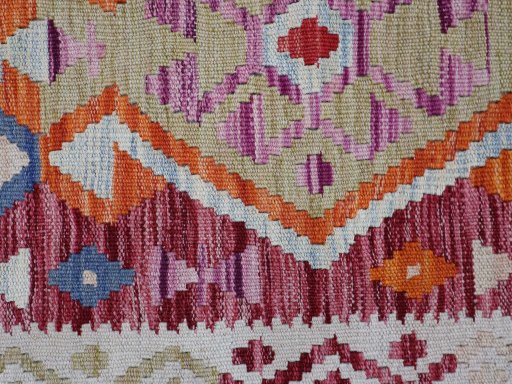 Backside of handmade New Modern Design rug showing knot structure and weave density