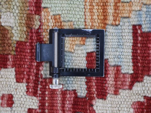 Corner detail of New Modern Design rug showing border pattern and Wool pile