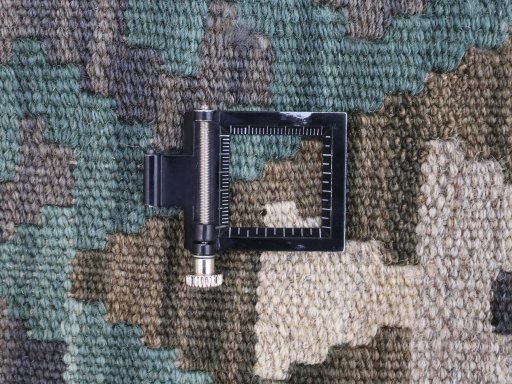 Corner detail of New Modern Design rug showing border pattern and Wool pile