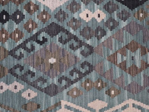 Backside of handmade New Modern Design rug showing knot structure and weave density