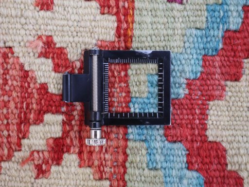 Corner detail of New Modern Design rug showing border pattern and Wool pile