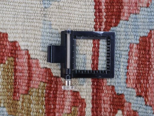 Corner detail of New Modern Design rug showing border pattern and Wool pile