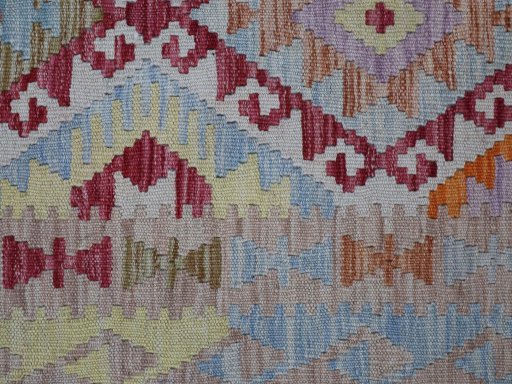 Backside of handmade New Modern Design rug showing knot structure and weave density
