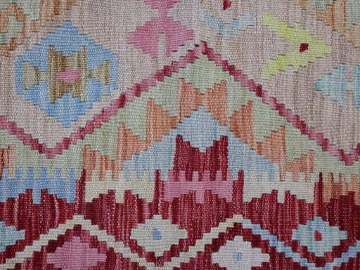 Backside of handmade New Modern Design rug showing knot structure and weave density