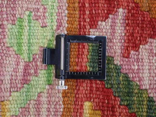 Corner detail of New Modern Design rug showing border pattern and Wool pile