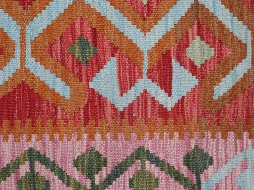 Backside of handmade New Modern Design rug showing knot structure and weave density