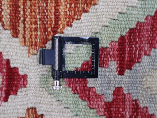 Corner detail of New Modern Design rug showing border pattern and Wool pile
