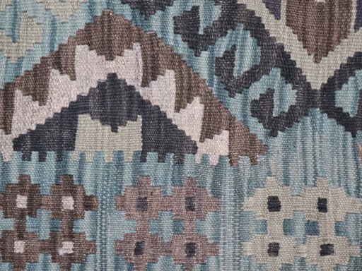 Backside of handmade New Modern Design rug showing knot structure and weave density