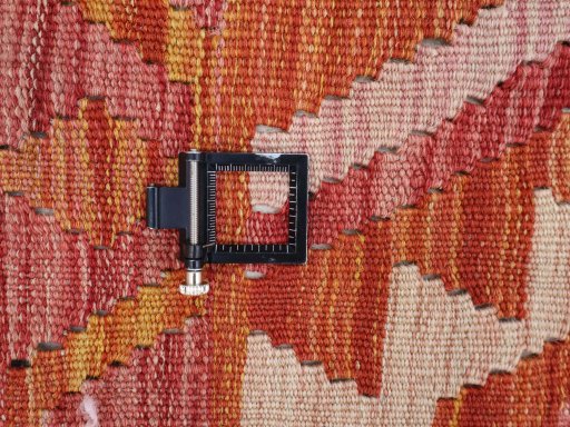 Corner detail of New Modern Design rug showing border pattern and Wool pile