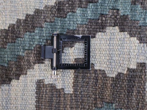 Corner detail of New Modern Design rug showing border pattern and Wool pile