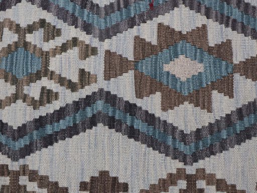 Backside of handmade New Modern Design rug showing knot structure and weave density