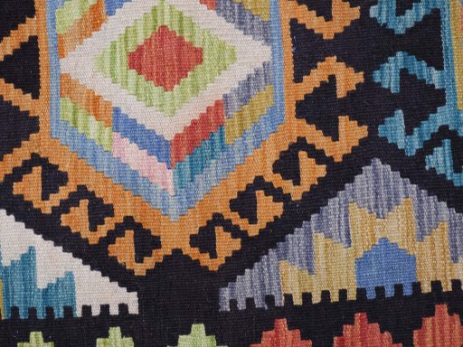 Backside of handmade New Modern Design rug showing knot structure and weave density