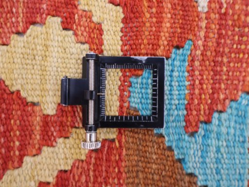 Corner detail of New Modern Design rug showing border pattern and Wool pile