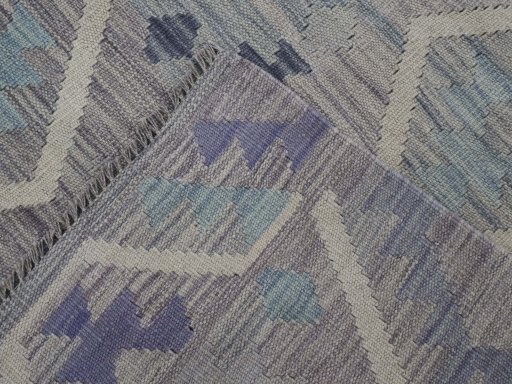 Surface texture of New Modern Design rug with natural Wool and intricate pattern