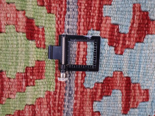 Corner detail of New Modern Design rug showing border pattern and Wool pile