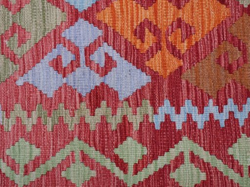 Backside of handmade New Modern Design rug showing knot structure and weave density