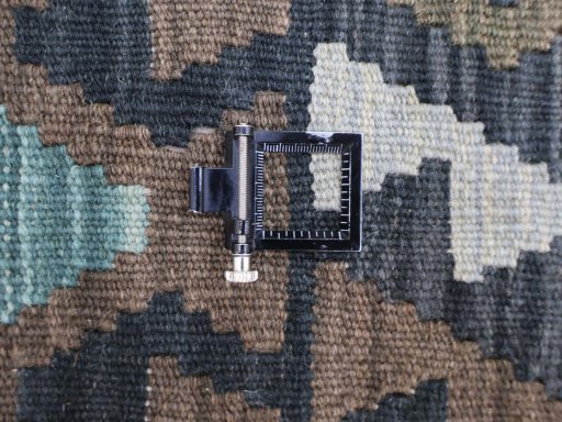 Corner detail of New Modern Design rug showing border pattern and Wool pile