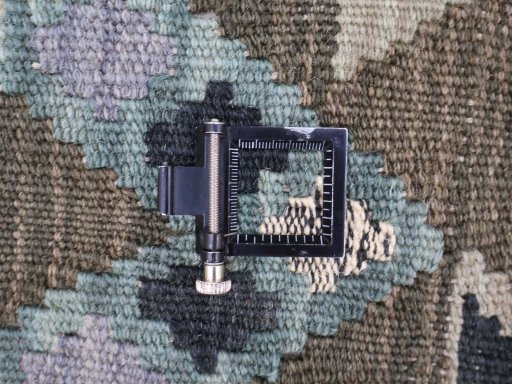 Corner detail of New Modern Design rug showing border pattern and Wool pile