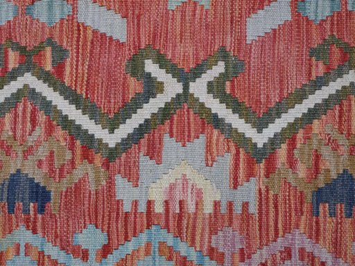 Backside of handmade New Modern Design rug showing knot structure and weave density