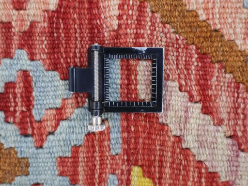 Corner detail of New Modern Design rug showing border pattern and Wool pile