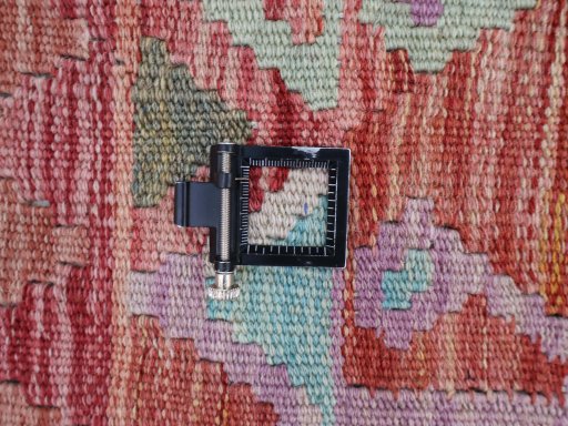 Corner detail of New Modern Design rug showing border pattern and Wool pile