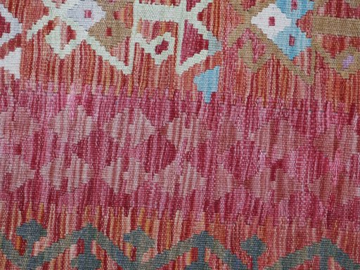 Backside of handmade New Modern Design rug showing knot structure and weave density