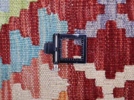 Corner detail of New Modern Design rug showing border pattern and Wool pile