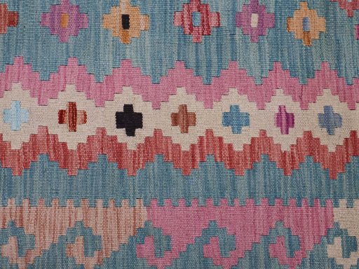 Backside of handmade New Modern Design rug showing knot structure and weave density