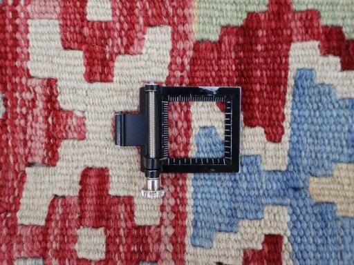 Corner detail of New Modern Design rug showing border pattern and Wool pile