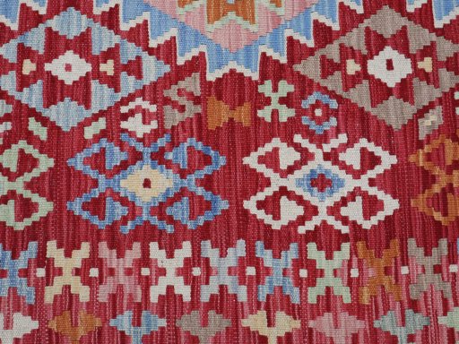 Backside of handmade New Modern Design rug showing knot structure and weave density