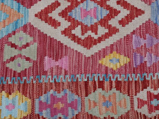 Backside of handmade New Modern Design rug showing knot structure and weave density