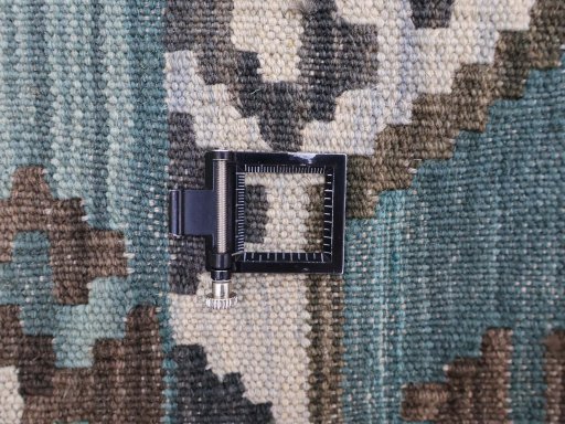 Corner detail of New Modern Design rug showing border pattern and Wool pile