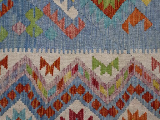 Backside of handmade New Modern Design rug showing knot structure and weave density