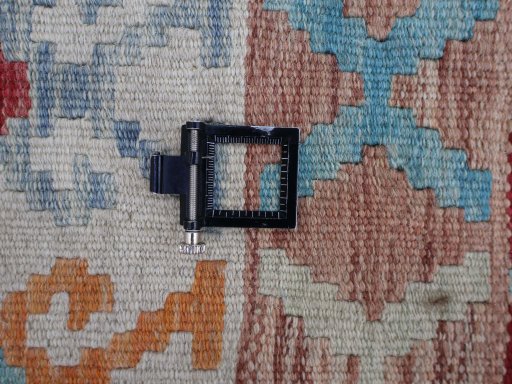 Corner detail of New Modern Design rug showing border pattern and Wool pile