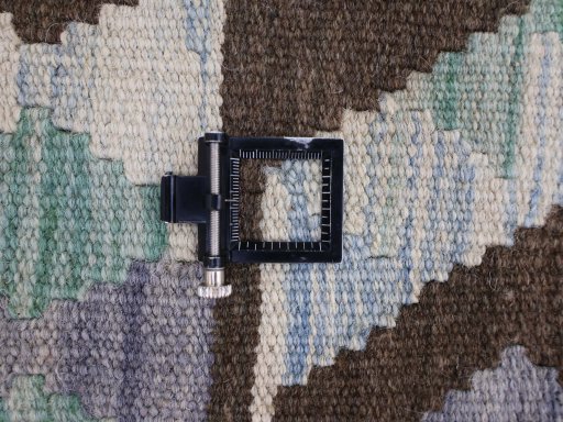 Corner detail of New Modern Design rug showing border pattern and Wool pile