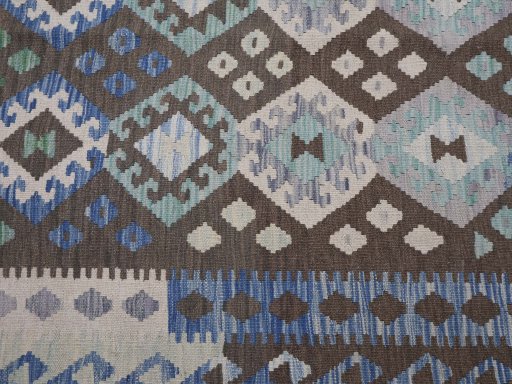 Backside of handmade New Modern Design rug showing knot structure and weave density
