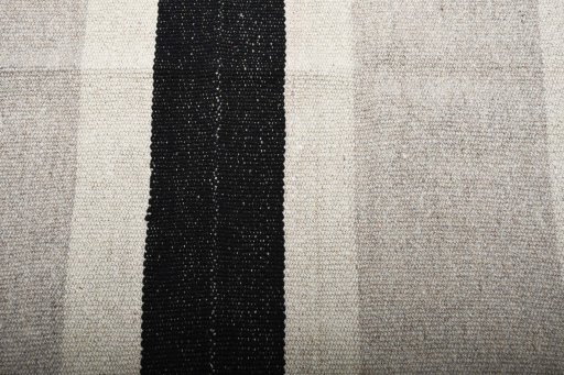 Backside of handmade New Modern Design rug showing knot structure and weave density