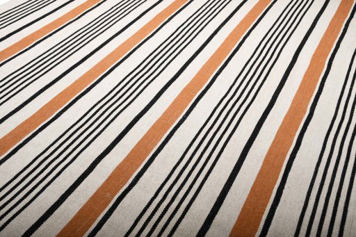 Backside of handmade New Modern Design rug showing knot structure and weave density