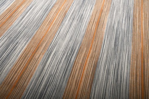 Backside of handmade New Modern Design rug showing knot structure and weave density