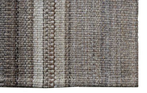 Backside of handmade New Modern Design rug showing knot structure and weave density