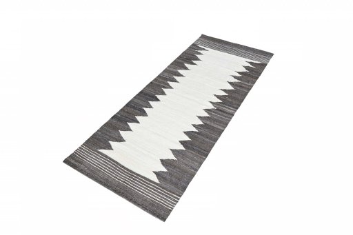 Corner detail of New Modern Design rug showing border pattern and Wool pile