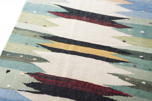 Surface texture of New Modern Design rug with natural Wool and intricate pattern