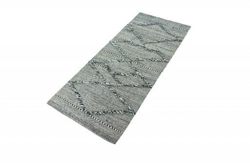 Corner detail of New Modern Design rug showing border pattern and Wool pile