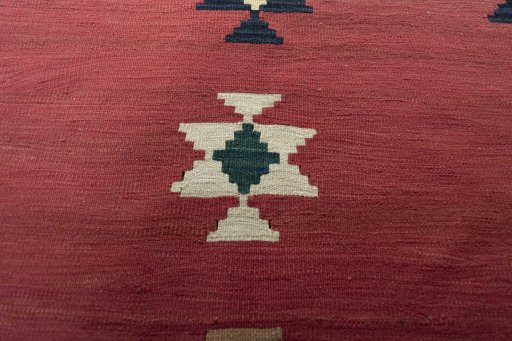 Backside of handmade New Modern Design rug showing knot structure and weave density