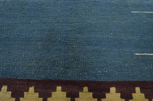 Backside of handmade New Modern Design rug showing knot structure and weave density