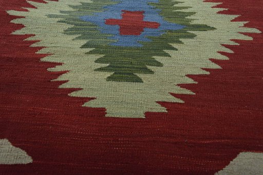 Backside of handmade New Modern Design rug showing knot structure and weave density