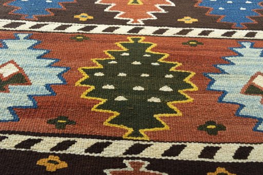 Backside of handmade New Modern Design rug showing knot structure and weave density