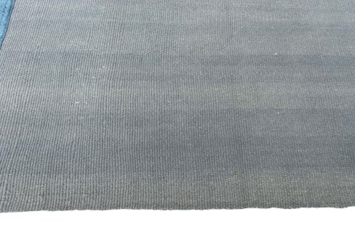 Close-up detail of New Modern Design rug from Iran / Persia showing Wool weave