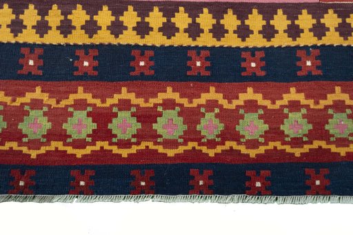 Backside of handmade New Modern Design rug showing knot structure and weave density