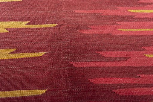 Backside of handmade New Modern Design rug showing knot structure and weave density